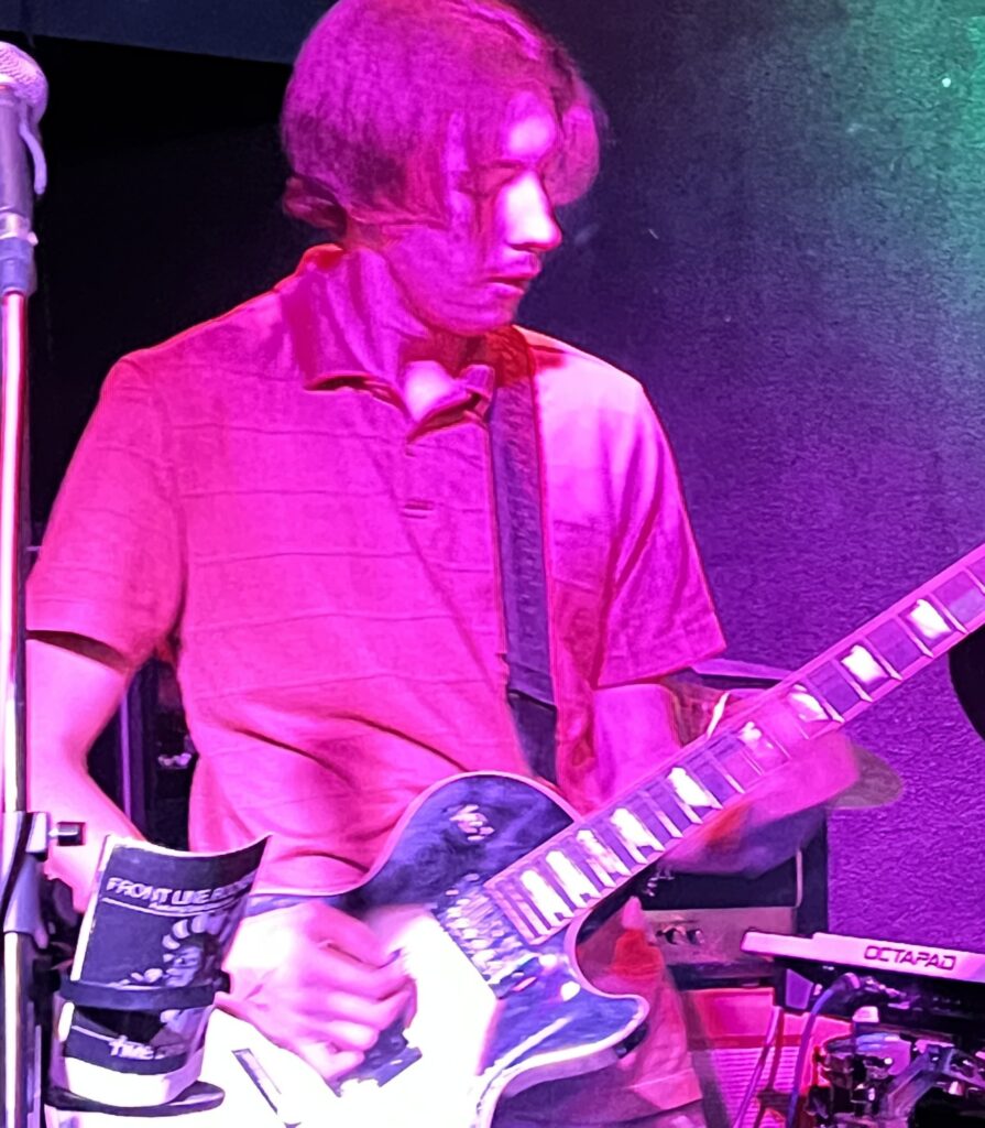 Nate playing guitar